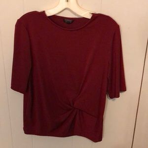 Red top with tie detail